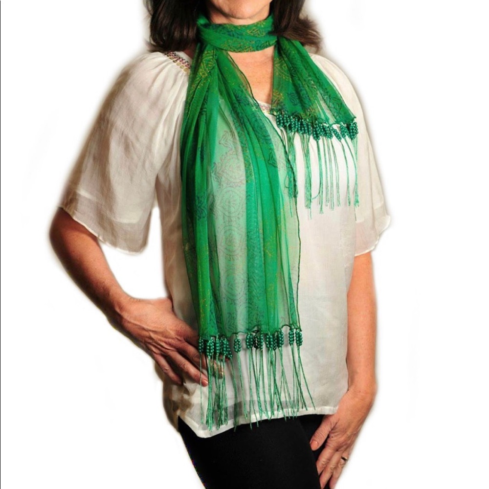 A green patterned handmade scarf